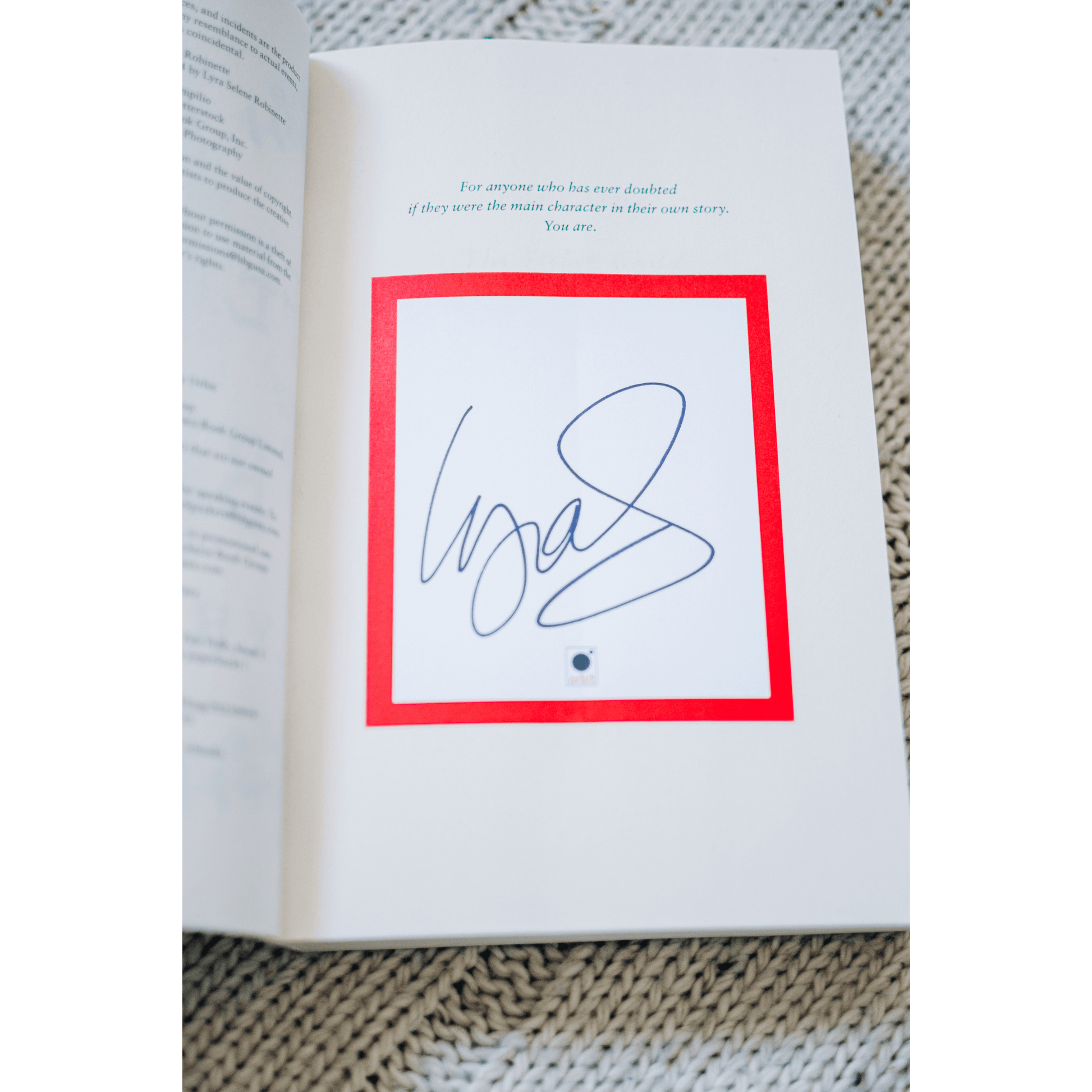 Signed page from a fantasy romance book in The Solo Spell subscription box.